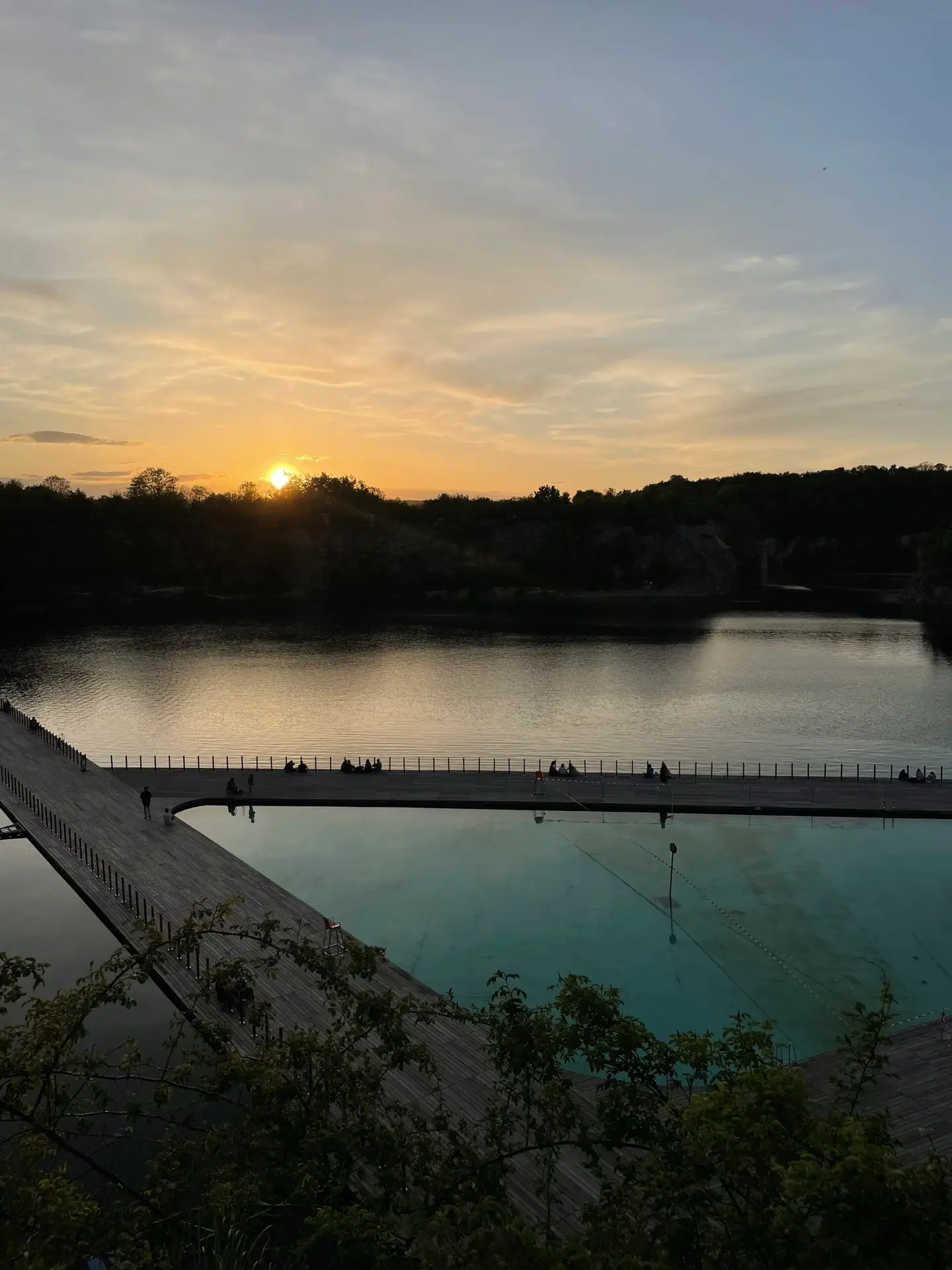 Zakrzówek in Kraków at sunset with a view of the swimming area and the reservoir